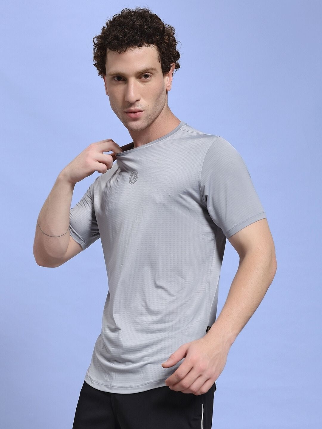 JET RUN REGULAR FIT T-SHIRT GREY worn by model in studio setting.