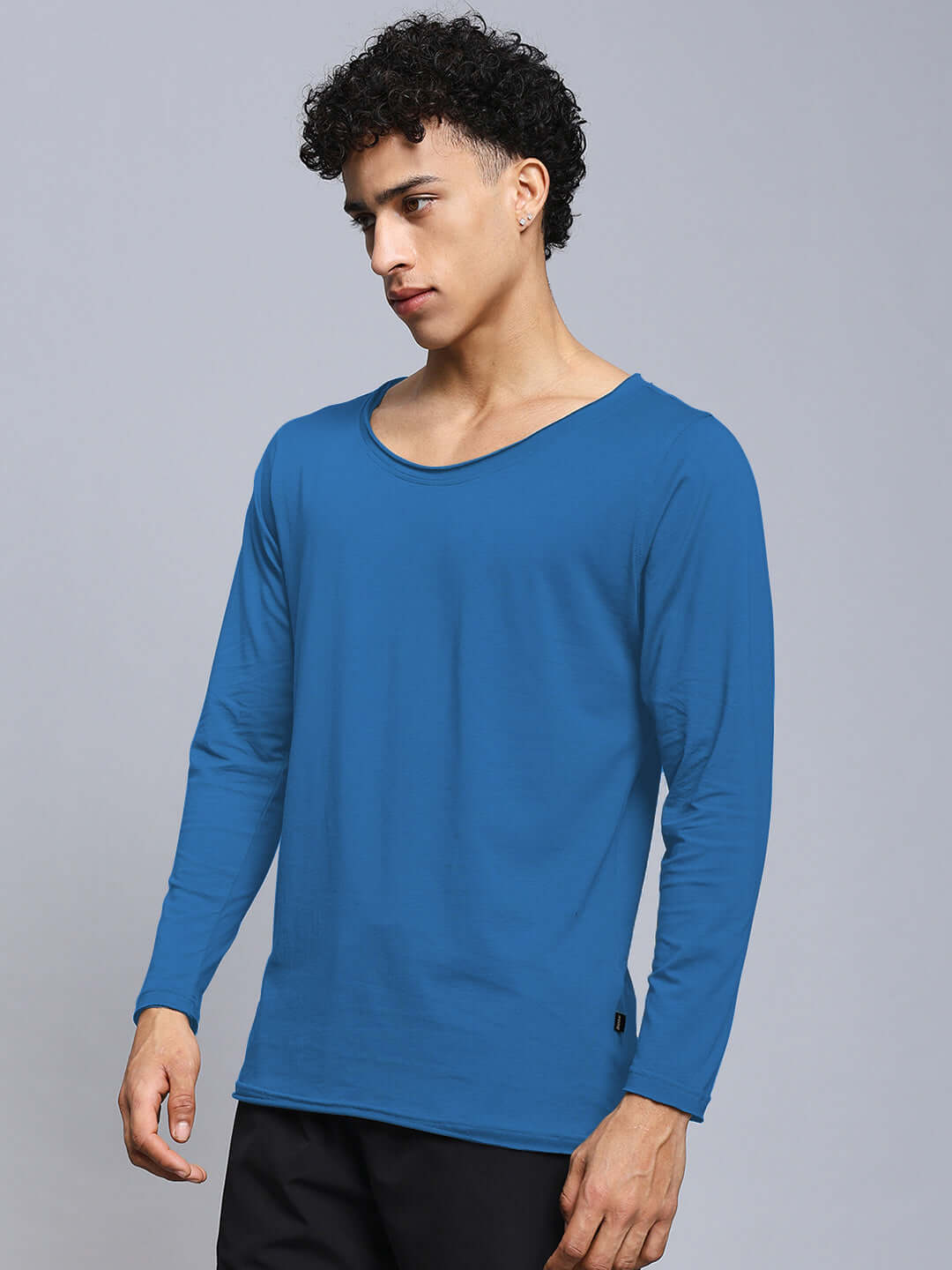 Alt Tag: Model wearing royal blue JOEL Slim Fit Sweatshirt made of 100% cotton, 190 GSM, showcasing premium fabric by Color By Colours.