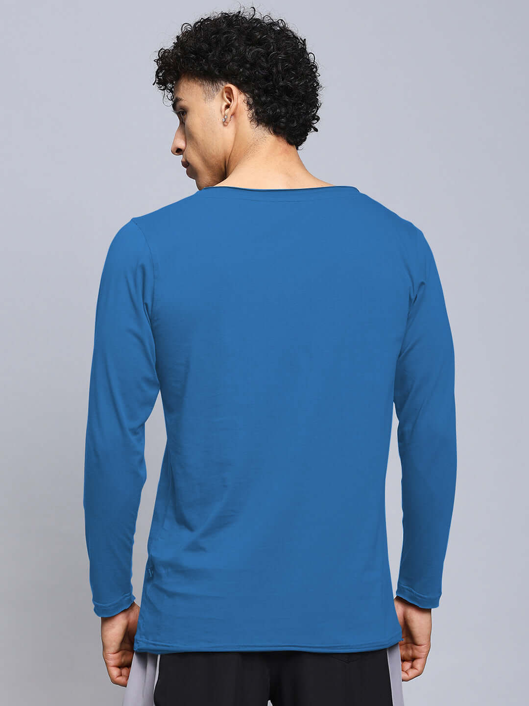 Back view of a man wearing a royal blue JOEL slim fit sweatshirt made from premium 100% cotton fabric.