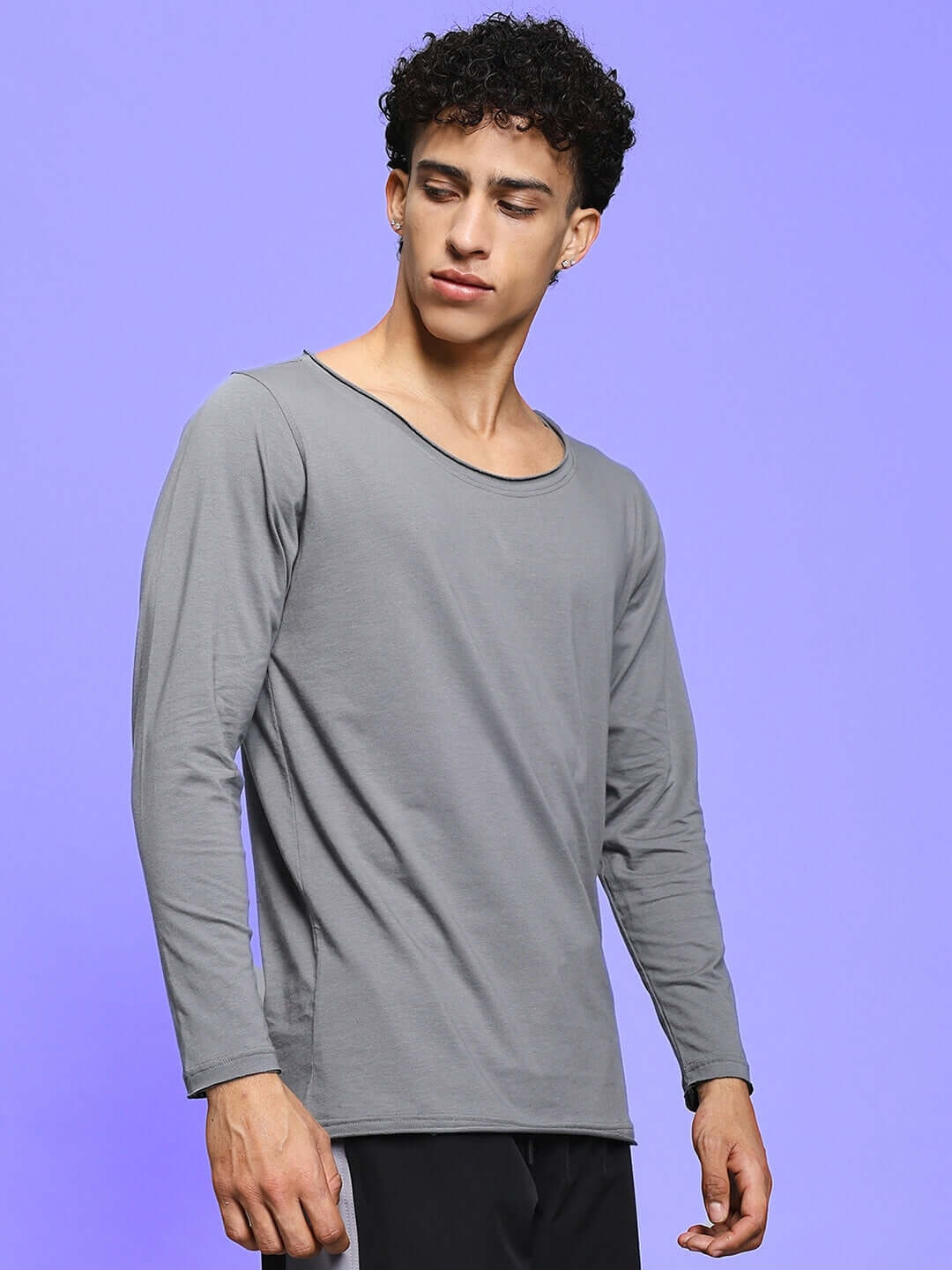 Model wearing JOEL Slim Fit Grey Sweatshirt by Color By Colours, made from premium 100% cotton fabric, showcasing stylish casual wear.