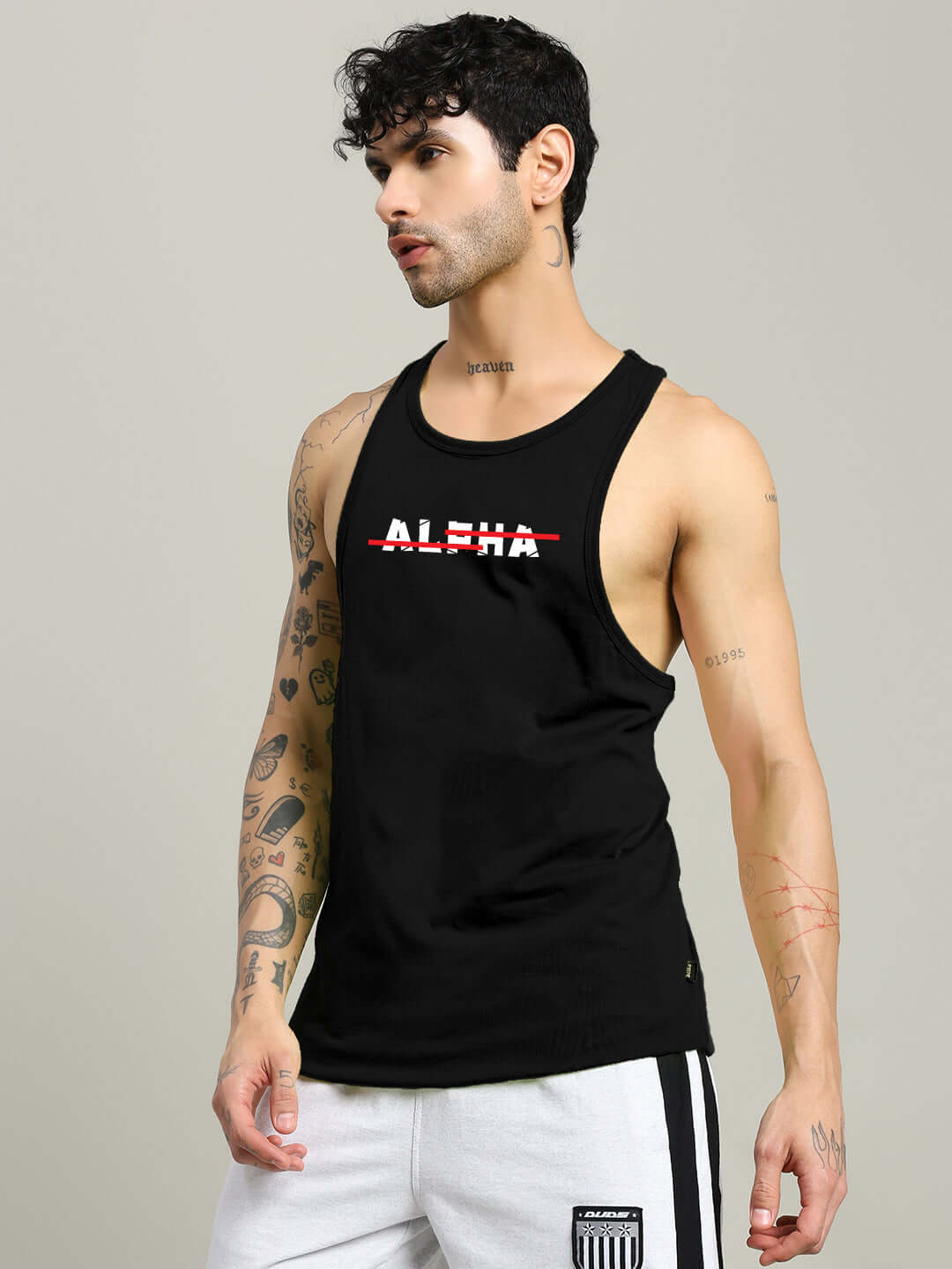 Man wearing JOJO ALPHA PRINTED GYM T-SHIRT BLACK with Alpha graphic