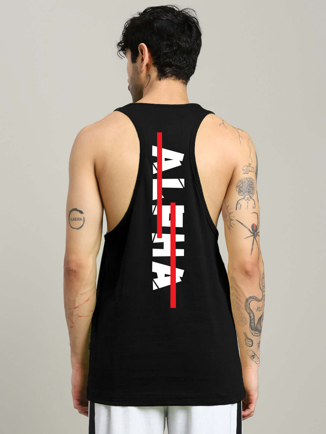 Black JOJO Alpha printed gym T-shirt with bold red line accent and unique back design.