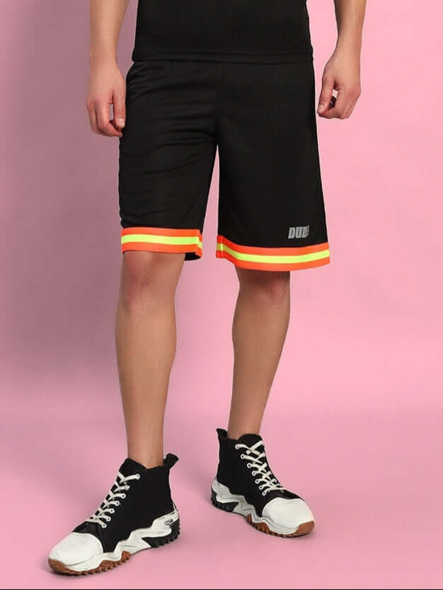 Model wearing Jordan Regular Fit Shorts Black with colorful stripe detail