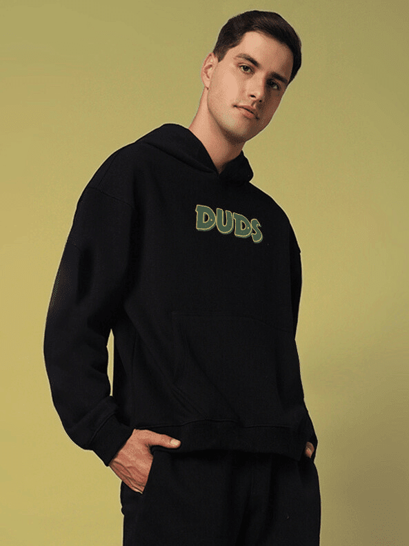 JUDY NICK ZOOTOPIA FLEECE HOODIE BLACK worn by model, iconic cartoon design for unisex streetwear fashion, versatile and playful.