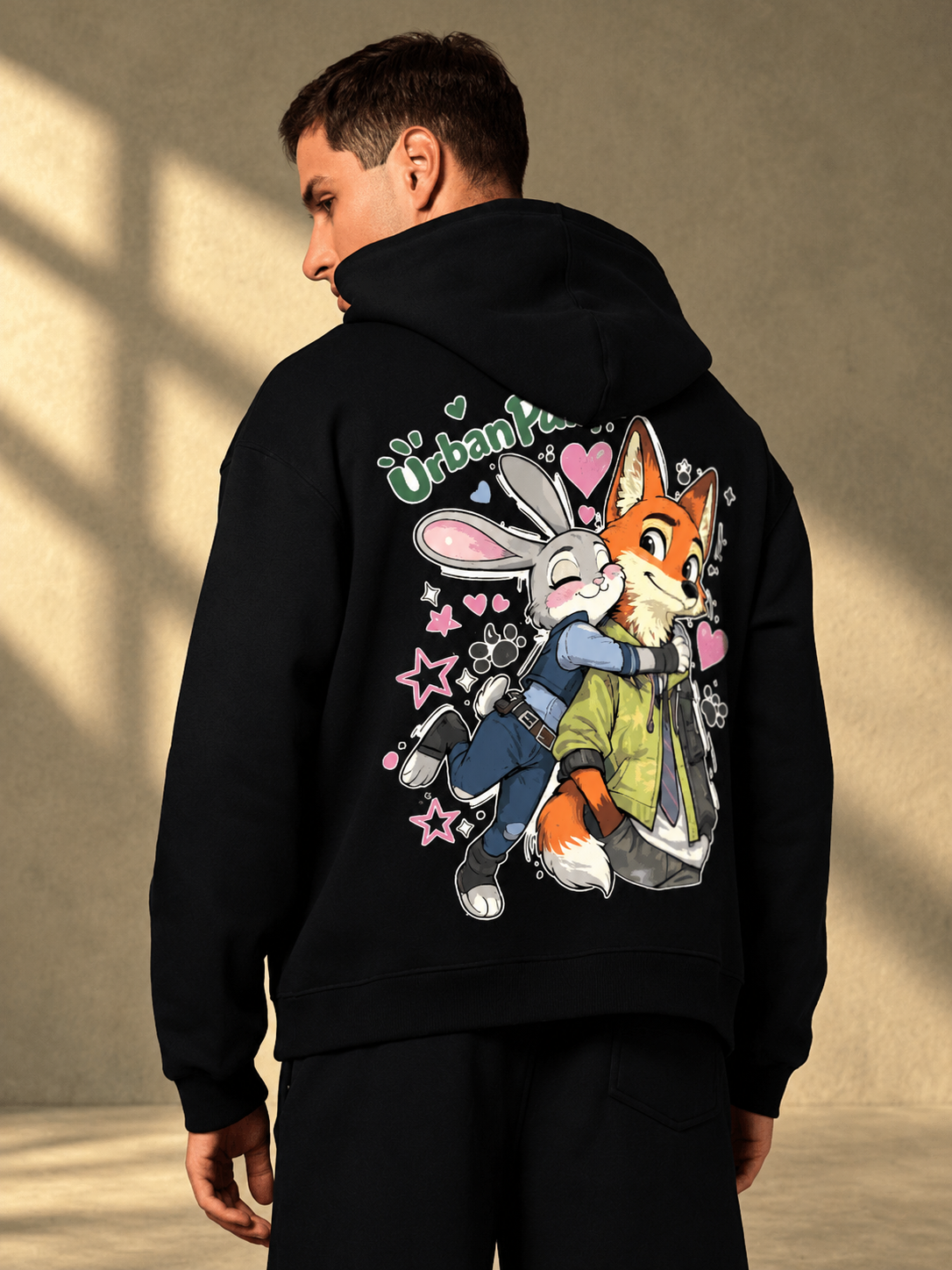 JUDY NICK ZOOTOPIA FLEECE CO-ORD BLACK unisex hoodie back print worn by man, casual streetwear style