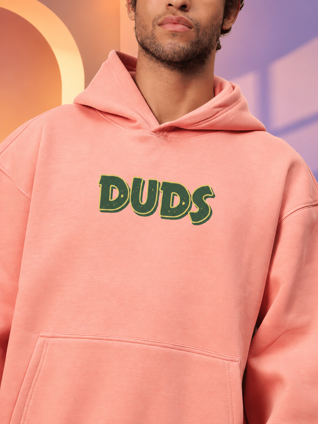 JUDY NICK ZOOTOPIA FLEECE CO-ORD PEACH hoodie worn by man, soft unisex streetwear for casual comfort and style