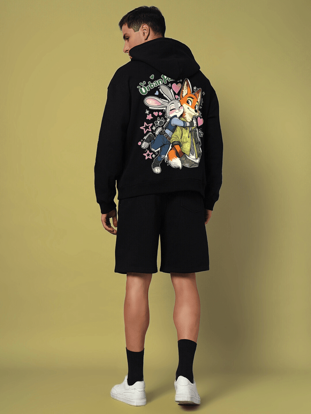 Back view of model wearing JUDY NICK ZOOTOPIA FLEECE CO-ORD BLACK showcasing cartoon streetwear style.