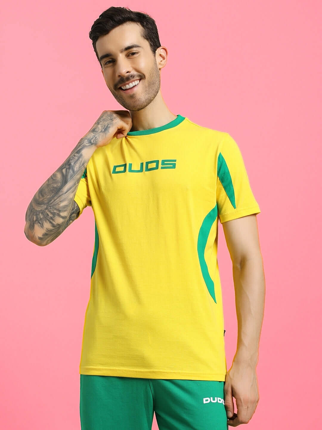 Model wearing JUMPY regular fit yellow t-shirt made from 100% cotton, premium fabric, showcasing casual style and comfort.