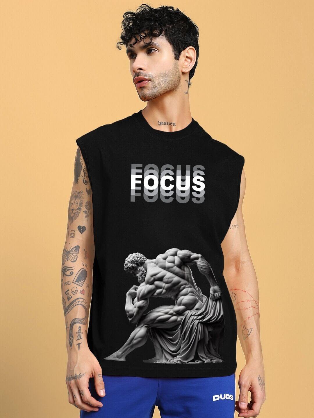 Black t-shirt featuring 'Focus' text and sculpture graphic, offered by DUDS with customizable size option for personalized fit.