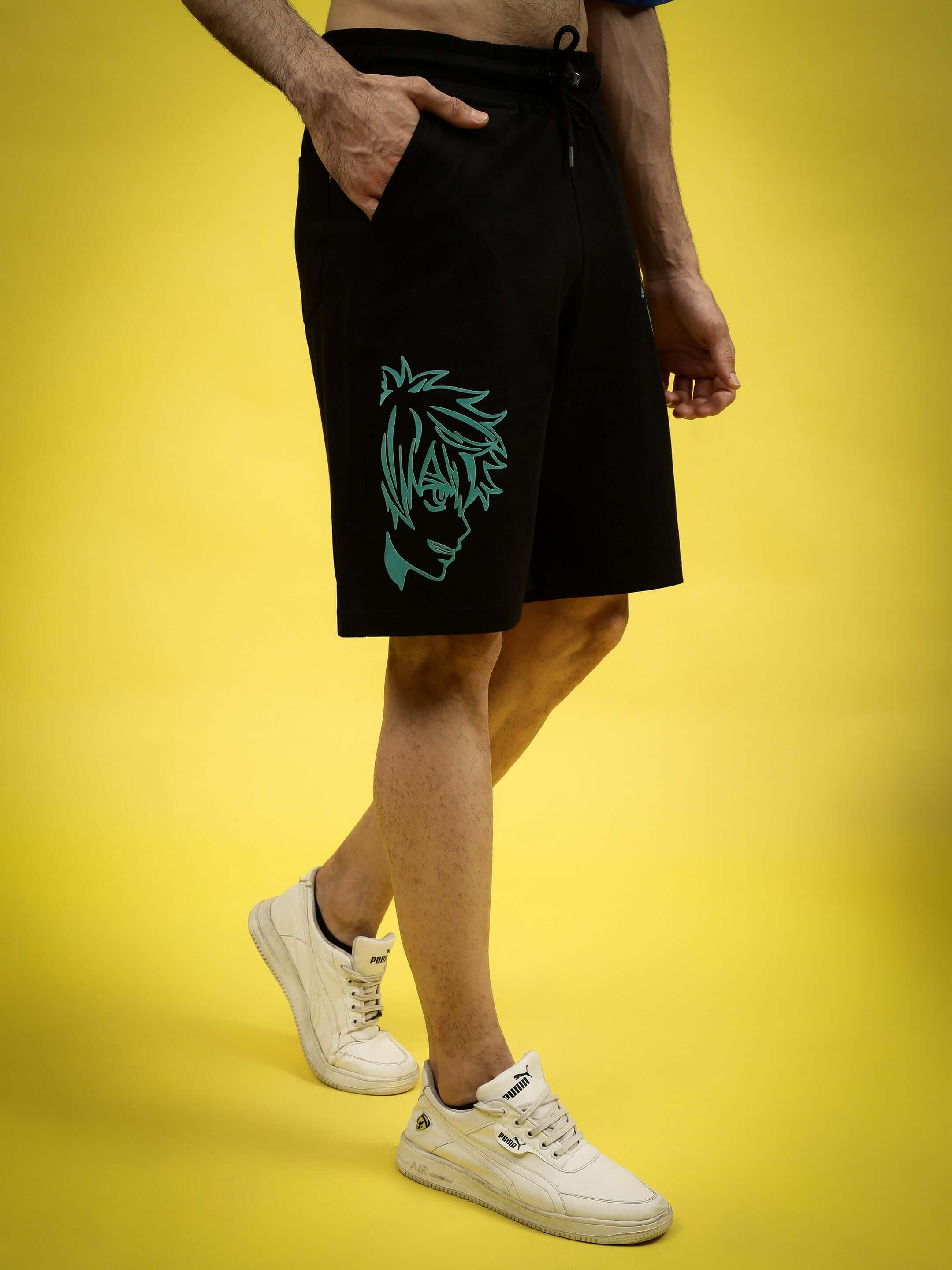 Man wearing Kakashi black shorts with graphic design, showcasing regular fit, customizable for prepaid orders.