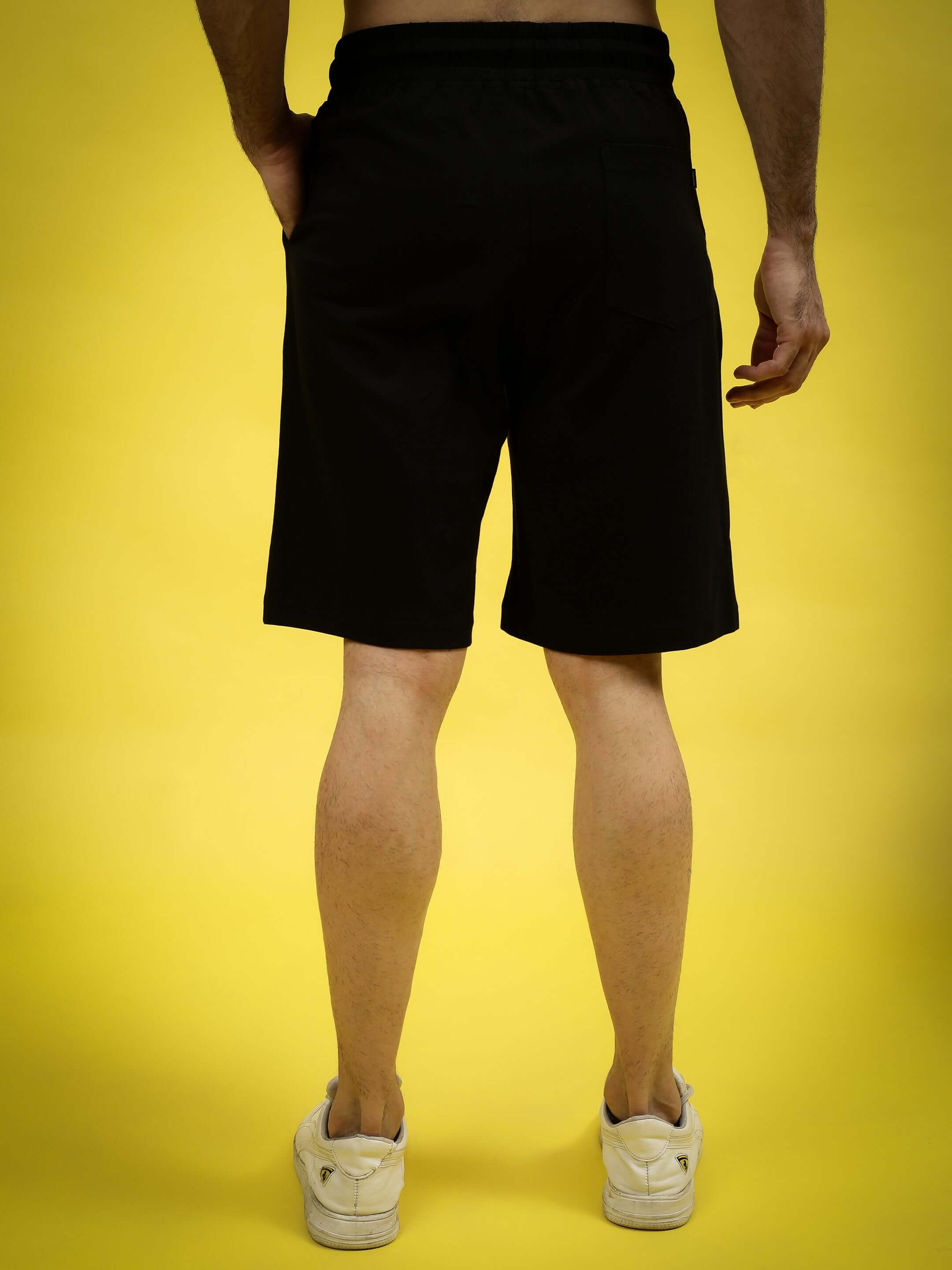 Back view of KAKASHI Regular Fit Black Shorts for men, featuring custom fit option.