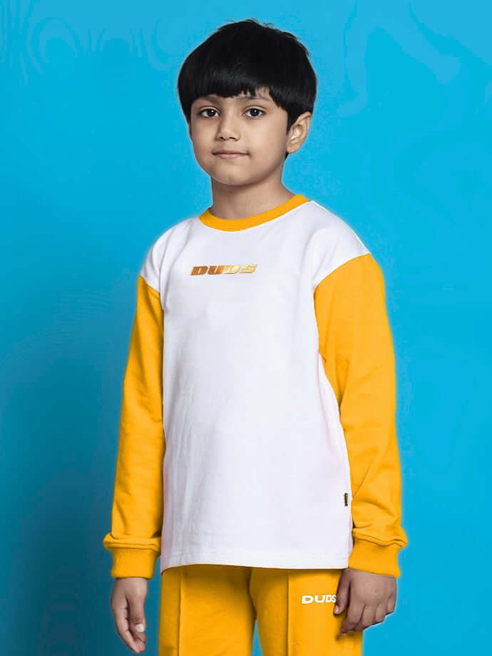 Boy wearing Kevin sweatshirt for boys girls white yellow in vibrant colors