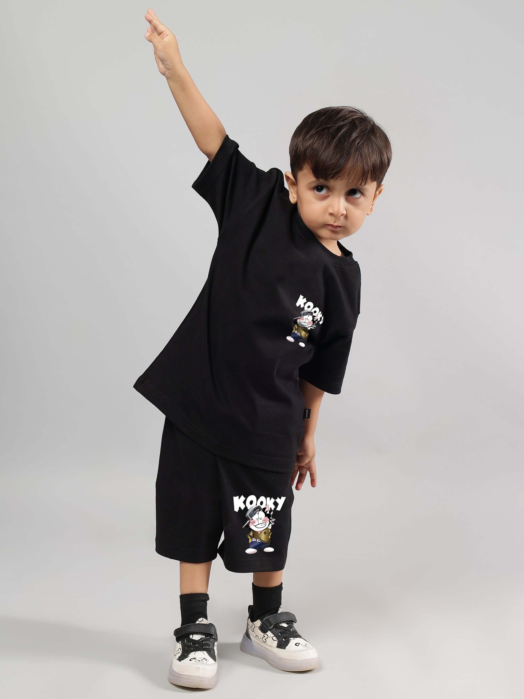 KOOKY CO-ORD FOR BOYS GIRLS BLACK - child wearing a matching quirky graphic t-shirt and shorts set, showcasing unisex style.