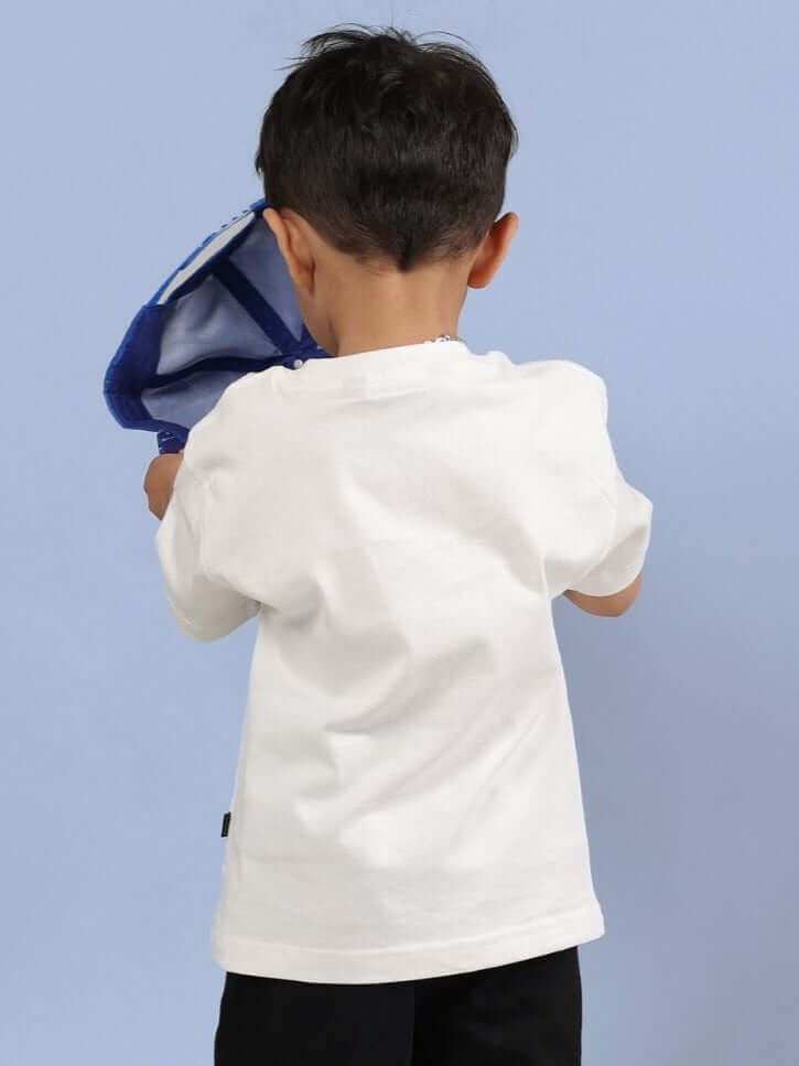 Child wearing an off-white Kung Fu Panda T-shirt for boys and girls, showcasing the back design. Perfect for a playful and comfortable look, KUNG FU PANDA T-SHIRT FOR BOYS AND GIRLS OFF WHITE