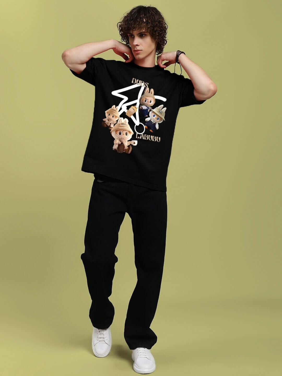 Model wearing LABUBU GANG PRINTED OVERSIZED T-SHIRT BLACK with graphic print, street style fashion for boys and girls, relaxed fit, premium fabric.