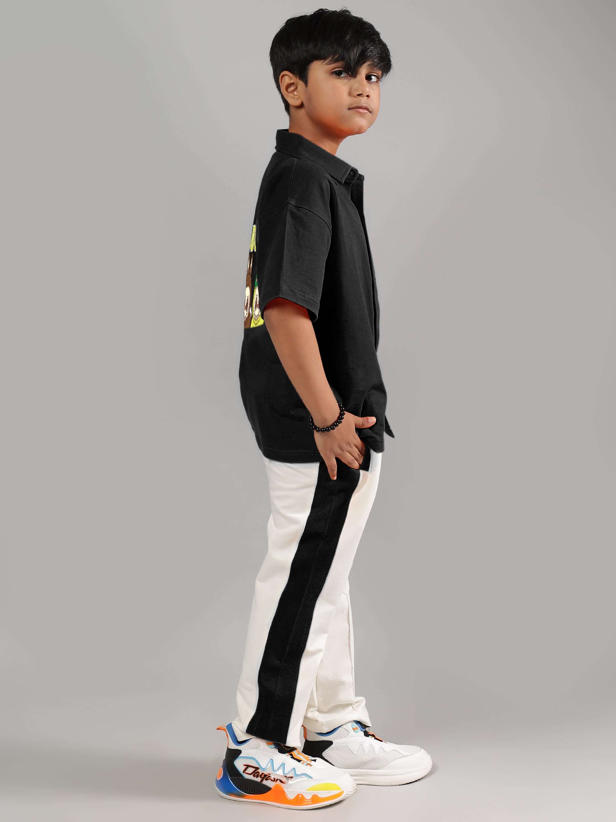 Child wearing LABUBU MYSTERY CO-ORD FOR BOYS GIRLS BLACK-OFF-WHITE, stylish and comfy kids' outfit for everyday activities.