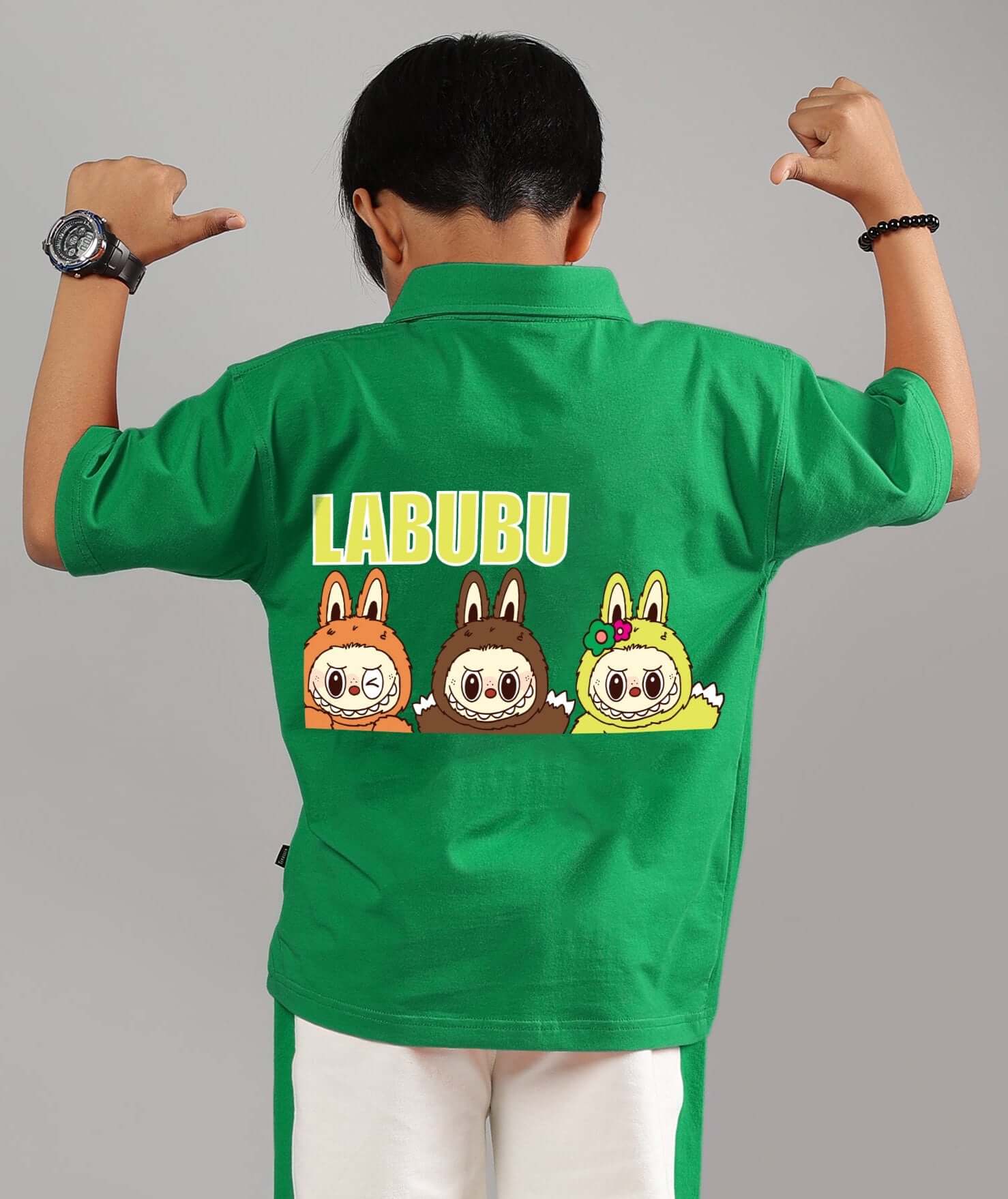 Boy wearing LABUBU MYSTERY SHIRT FOR BOYS GIRLS GREEN featuring playful cartoon characters