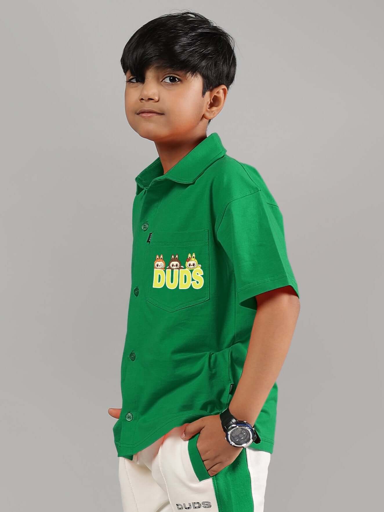 Child wearing LABUBU MYSTERY SHIRT FOR BOYS GIRLS GREEN, featuring playful design and premium cotton-blend fabric for comfort