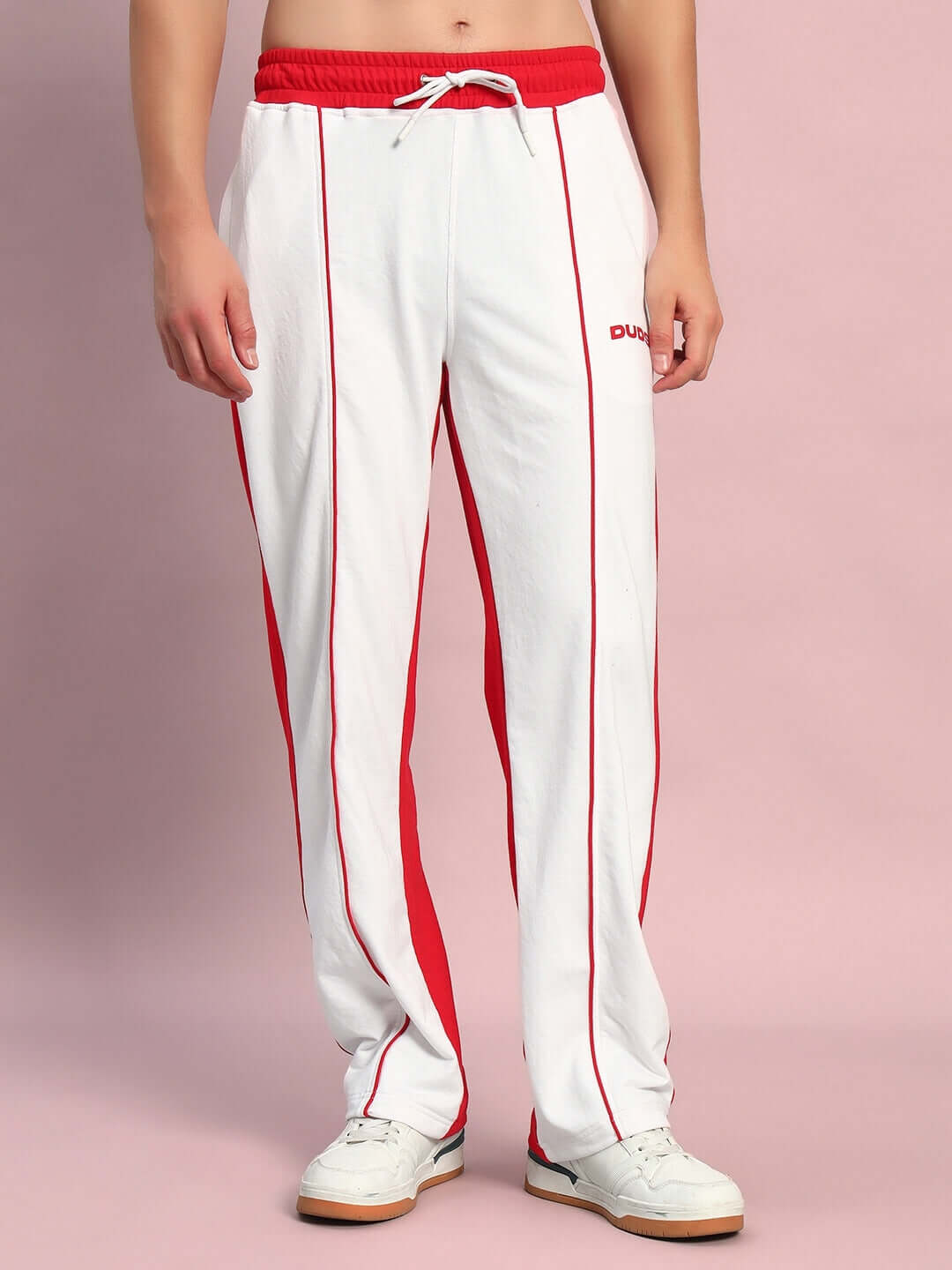 LAGOON Relaxed Fit Joggers in white and red, shown on model. Made-to-order by DUDS, with custom fit option available.