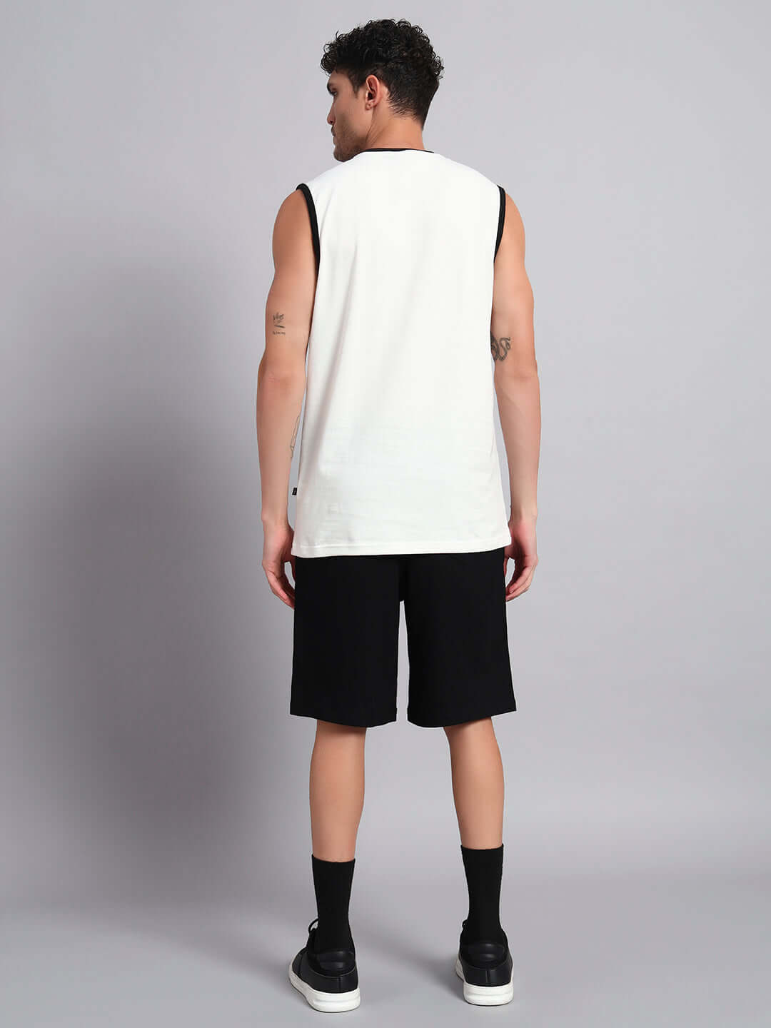 Back view of LAZIO CO-ORD SET OFF-WHITE BLACK showcasing premium cotton French terry fabric in a stylish ensemble.