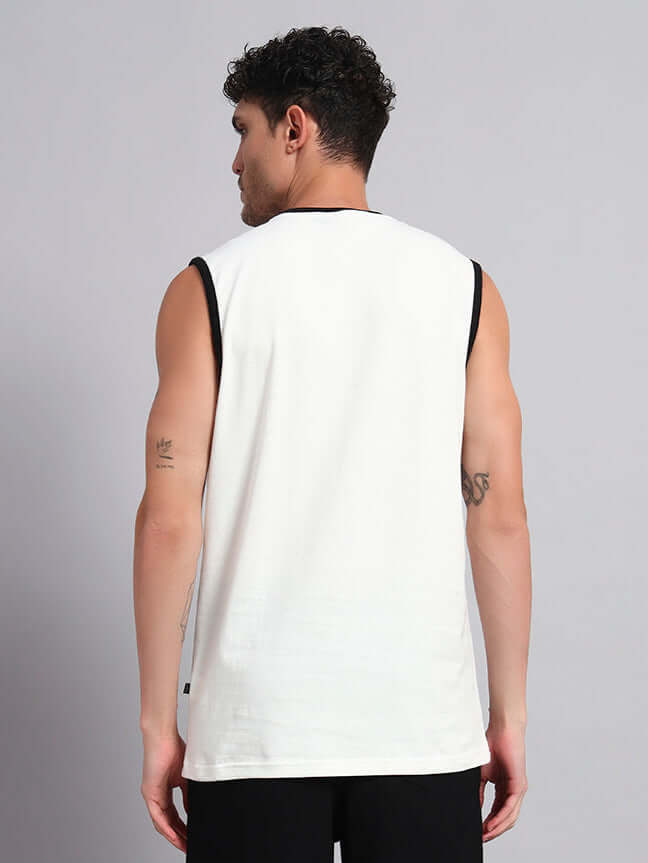 Back view of model wearing LAZIO REGULAR FIT T-SHIRT OFF-WHITE, sleeveless design, showcasing its classic style and breathable fabric.