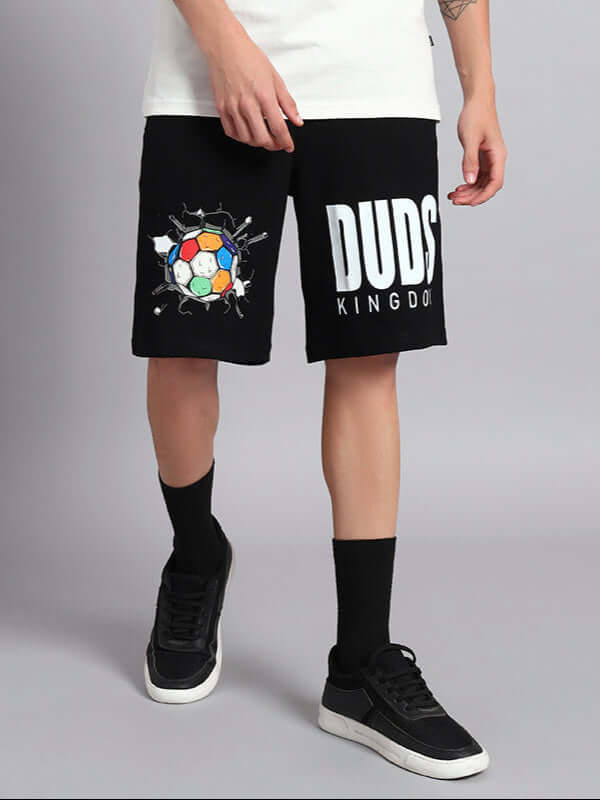 Model wearing black LAZIO Summer Shorts with bold DUDS logo, customizable size option available for prepaid orders.