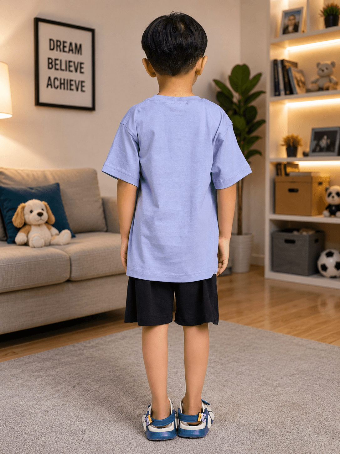 LAZY DAY CO-ORD FOR BOYS GIRLS LAVENDER BLACK worn by a boy, showing the back view in a cozy indoor setting.
