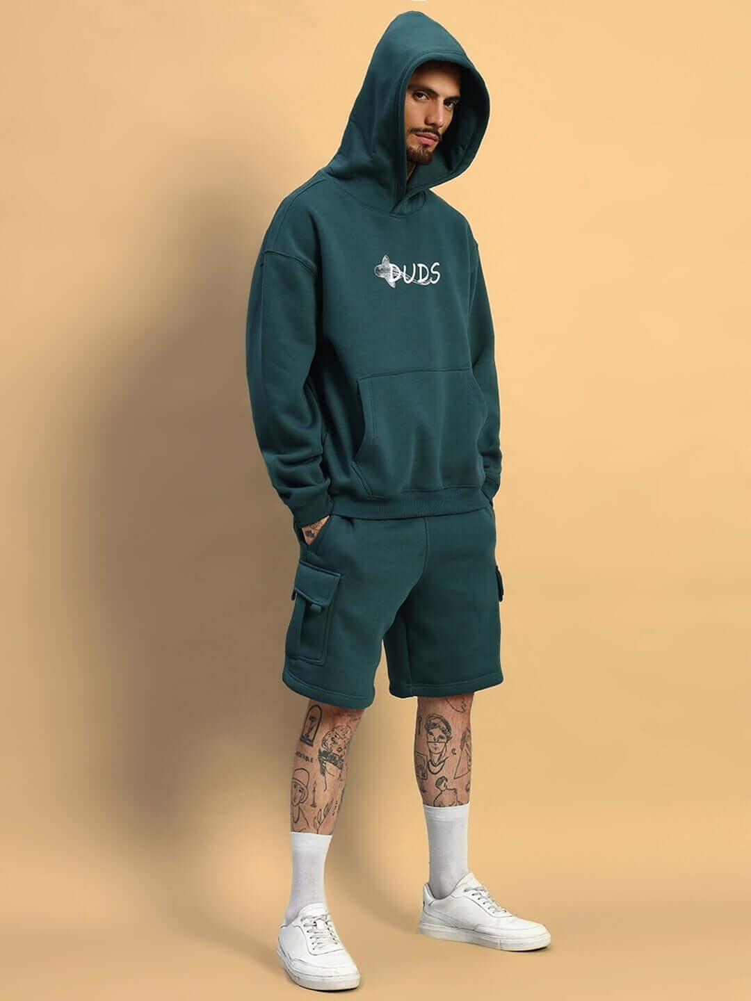 Model wearing LEOPARD SHARK FLEECE CO-ORD TEAL GREEN, showcasing premium fleece streetwear for style and comfort.