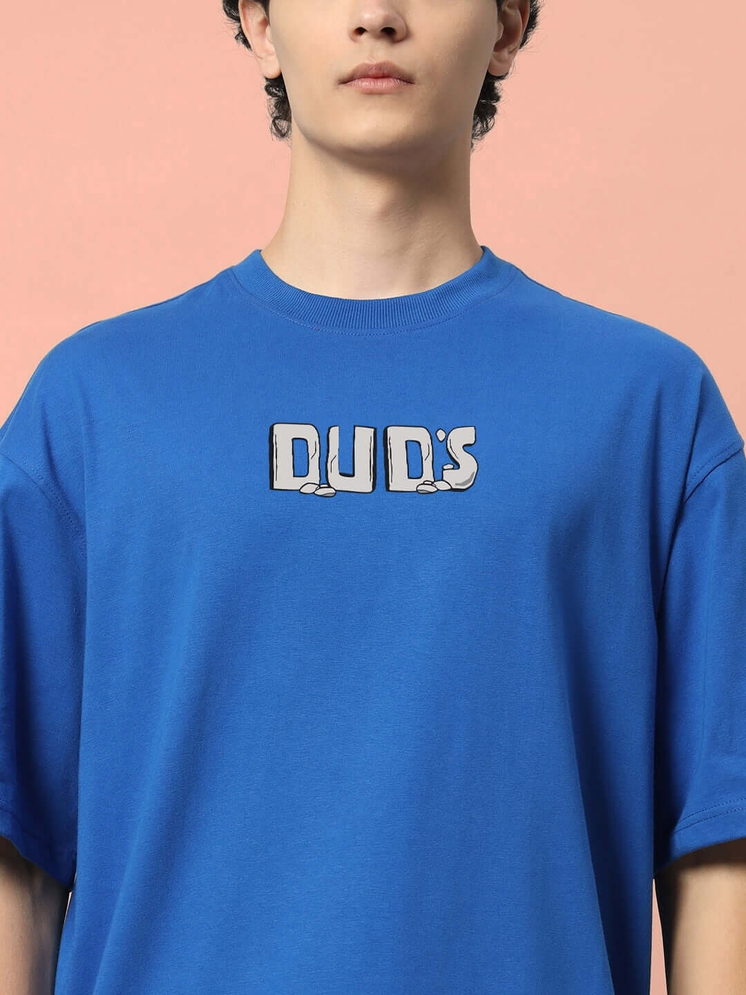 LETS ROCK OVER-SIZED T-SHIRT ROYAL BLUE featuring a relaxed fit and graphic design, perfect for a vibrant style statement.