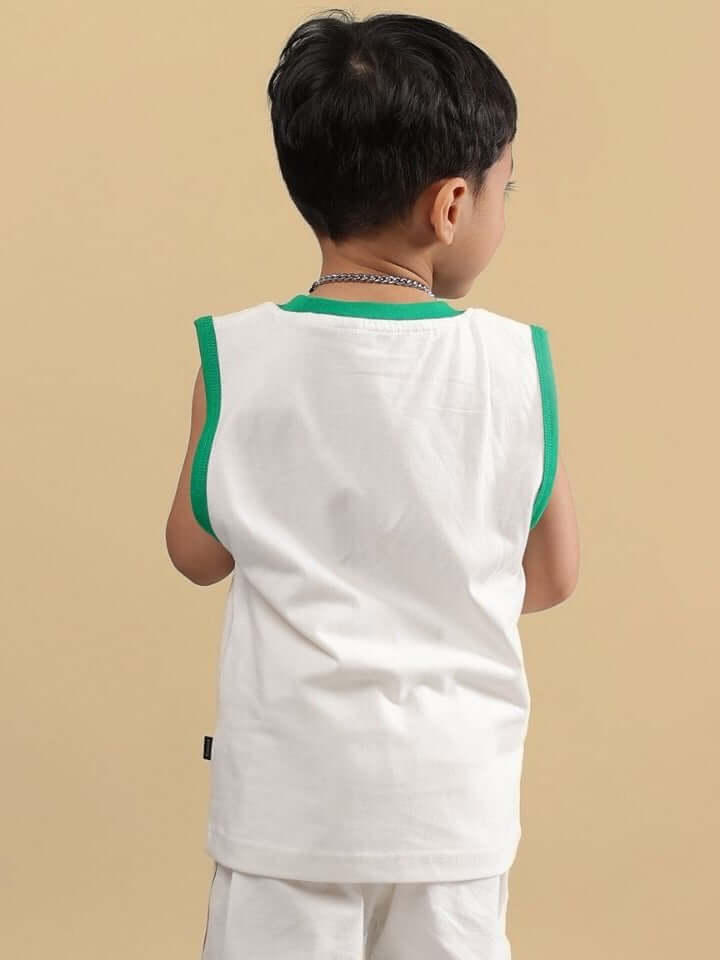 Child wearing LET'S SMILE T-SHIRT FOR BOYS AND GIRLS OFF WHITE with green accents, back view.
