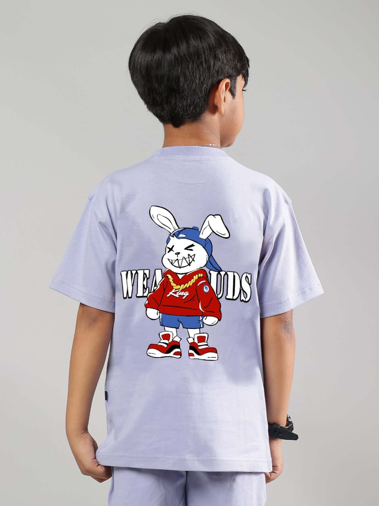 Lilac rapper bunny t-shirt for boys and girls, featuring cartoon bunny in streetwear, made by DUDS, shown on child model.