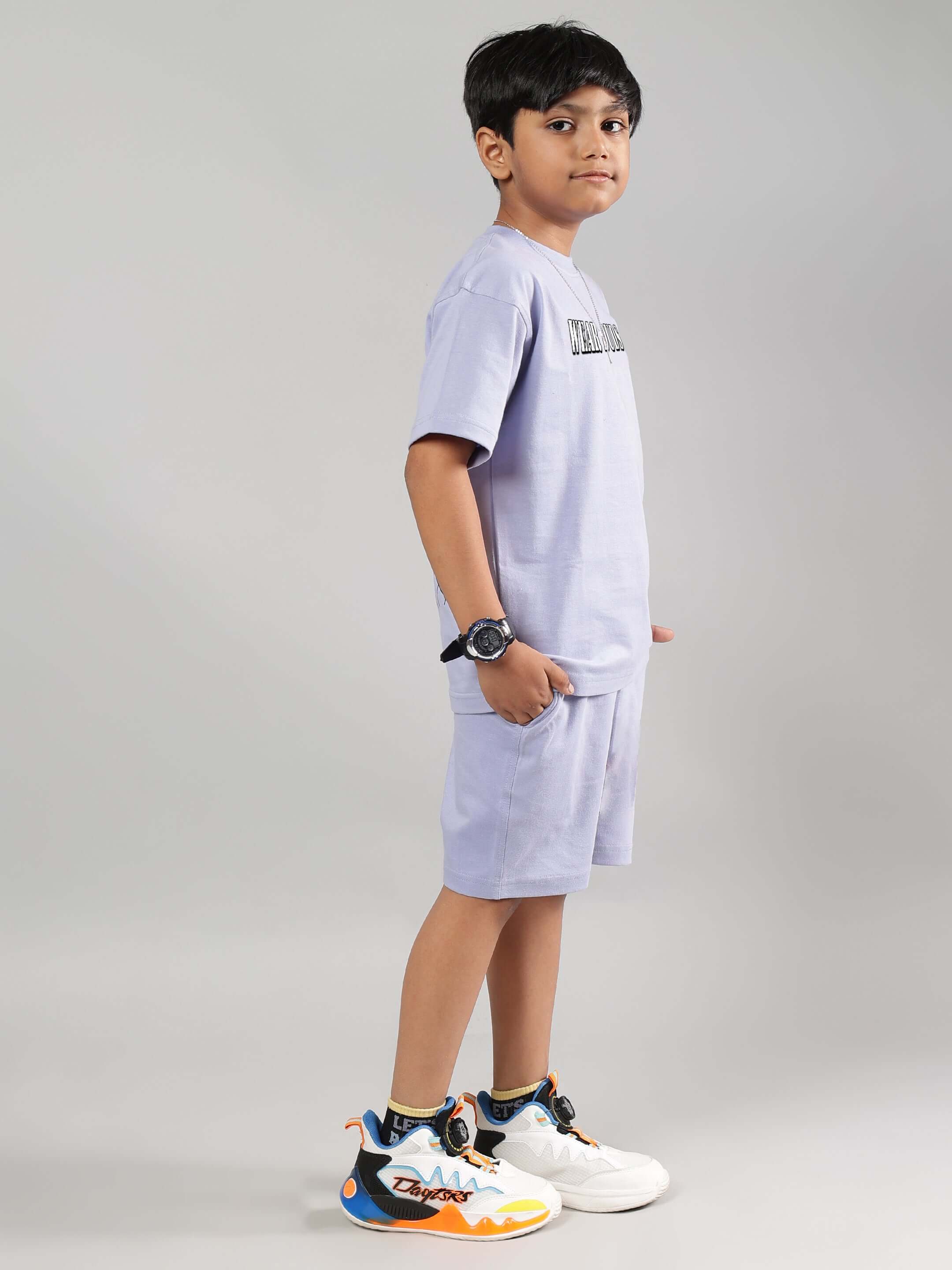 Child wearing the RAPPER BUNNY CO-ORD FOR BOYS GIRLS LILAC outfit, featuring a comfortable lilac set, perfect for casual outings.