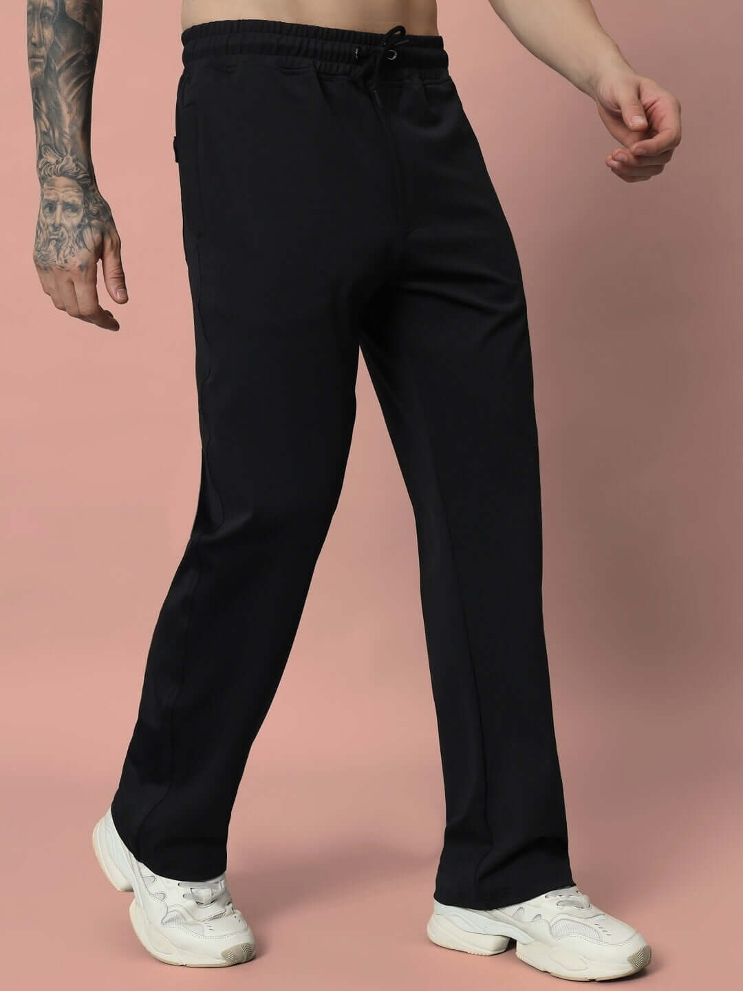 Person wearing LIMBER RELAXED PANT JOGGER in black, showcasing a casual and comfortable fit, perfect for customization and style.
