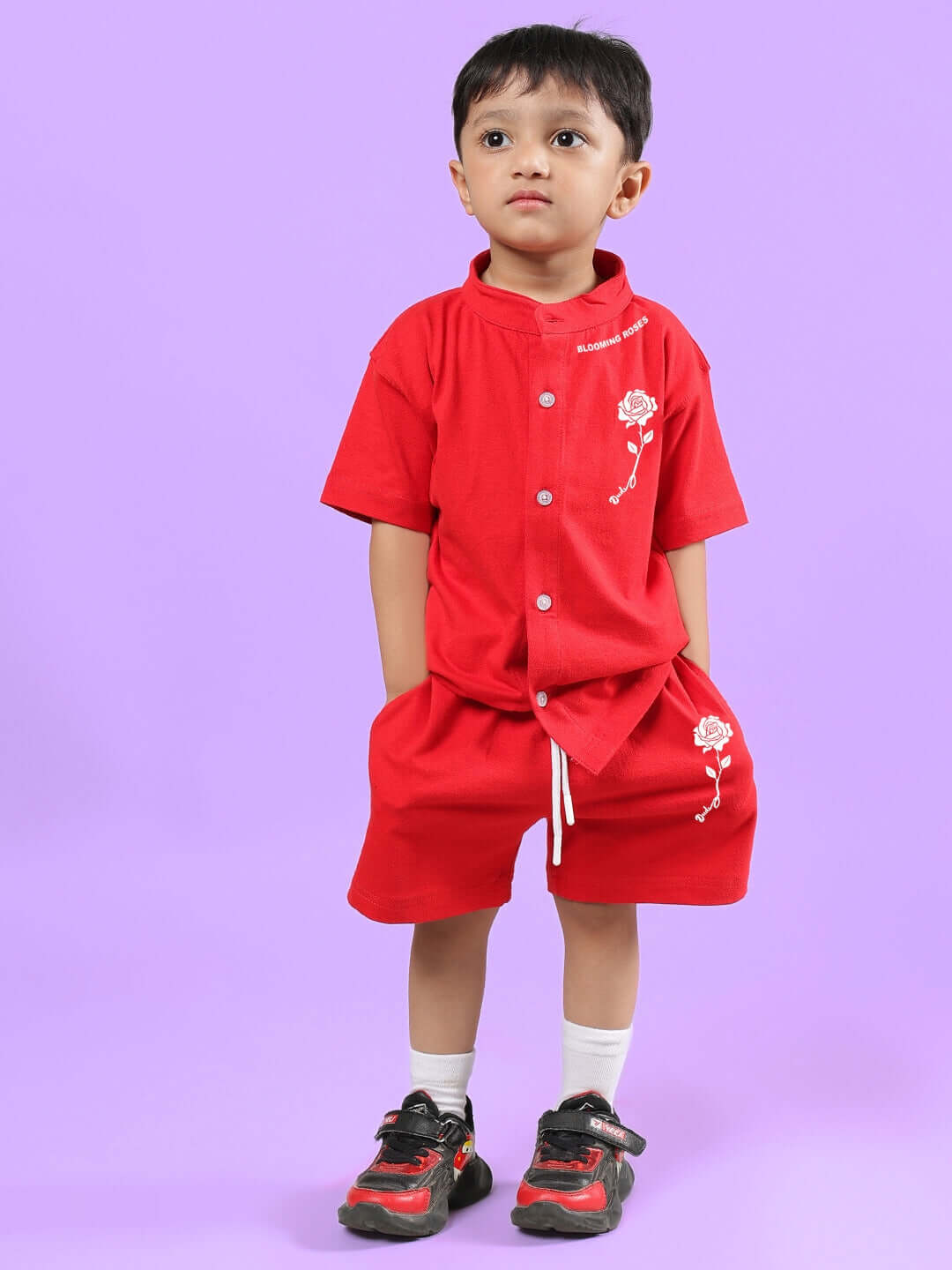 LIMBO CO-ORD FOR BOYS & GIRLS RED - stylish red outfit modeled by a child, featuring a comfortable design perfect for any occasion.