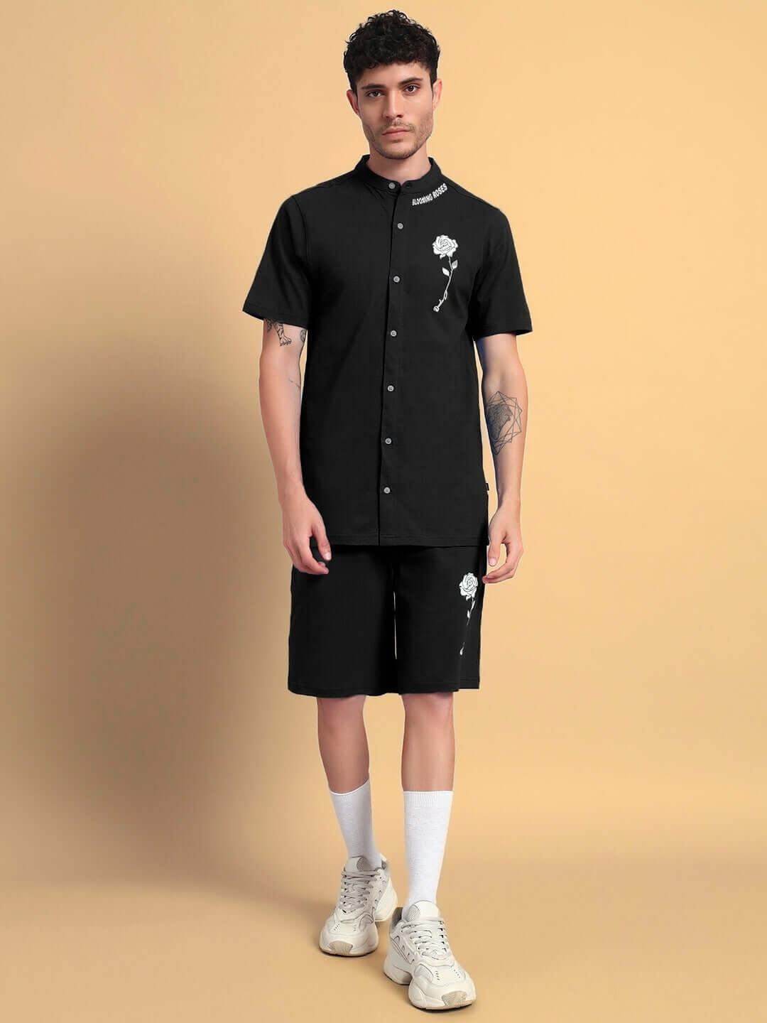 Black LIMBO CO-ORD set featuring premium cotton French terry shirt and shorts. Model showcasing stylish summer outfit.