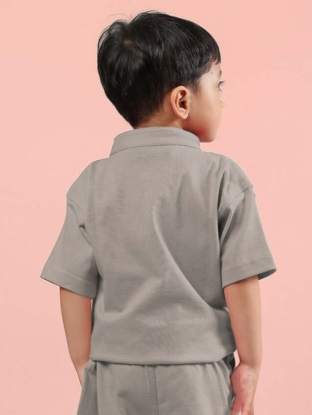 Child wearing LIMBO SHIRT FOR BOYS & GIRLS GREY, showcasing back view
