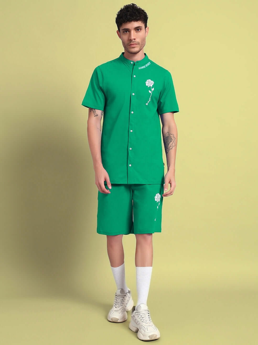 Model wearing the LIMBO green co-ord set made of premium cotton fabric, featuring embroidered details, styled with white sneakers.