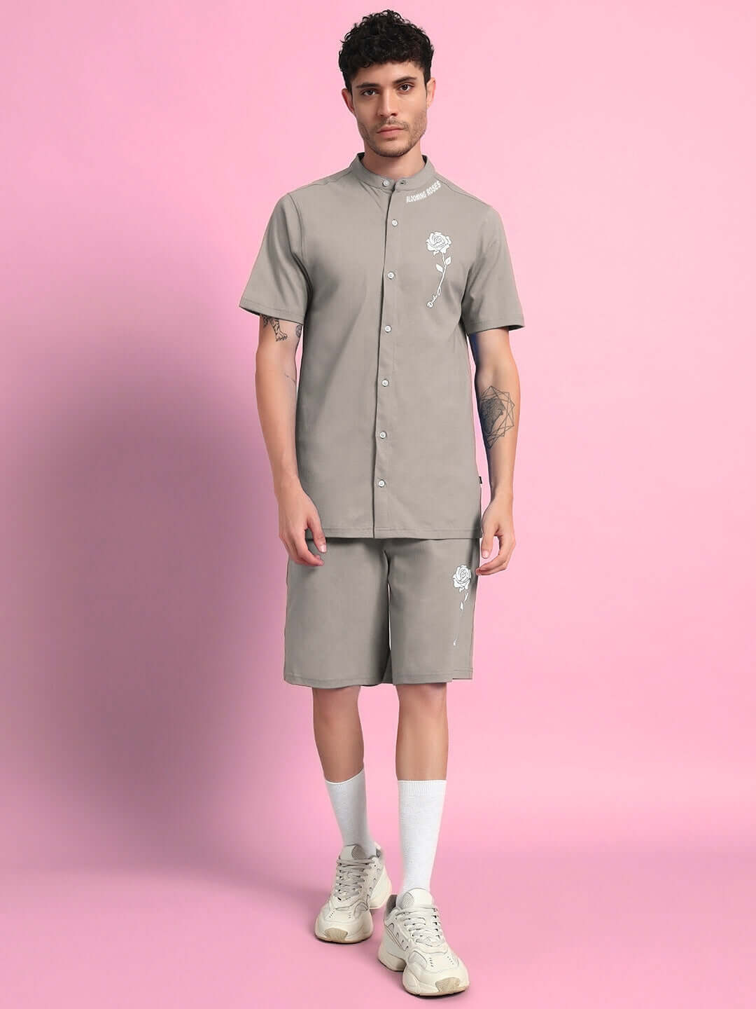 Model wearing LIMBO CO-ORD SET in grey, premium cotton French Terry Lycra shirt and shorts, casual fashion from India.