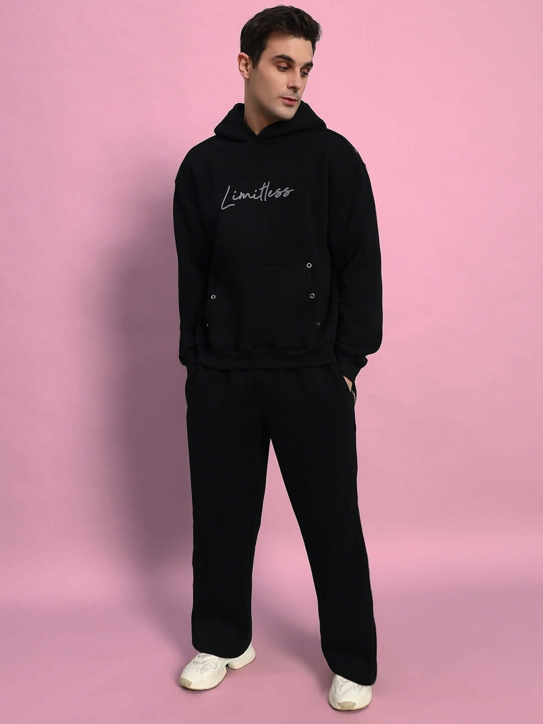 LIMITLESS FLEECE REFLECTOR CO-ORD BLACK on a model, showcasing stylish athleisure wear suitable for casual outings and workouts.