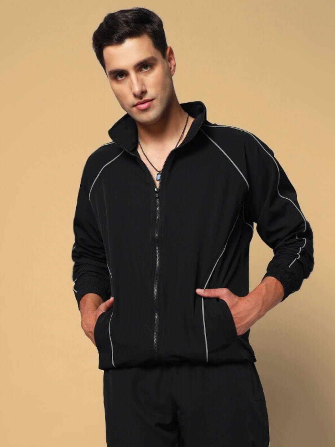 Model wearing LOCO Reflector Parachute Sports Jacket in black, featuring custom fit and tailored craftsmanship by DUDS.