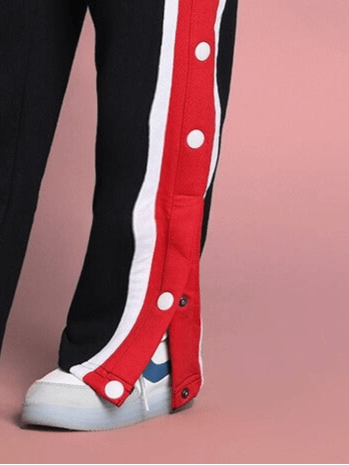 Black magician jogger for boys & girls with red and white striped button-up detail, perfect for customizable fit. Made by DUDS.