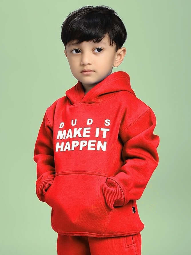Boy wearing MAKE IT HAPPEN FLEECE HOODIE FOR BOYS AND GIRLS RED, showcasing vibrant style and comfort for kids.