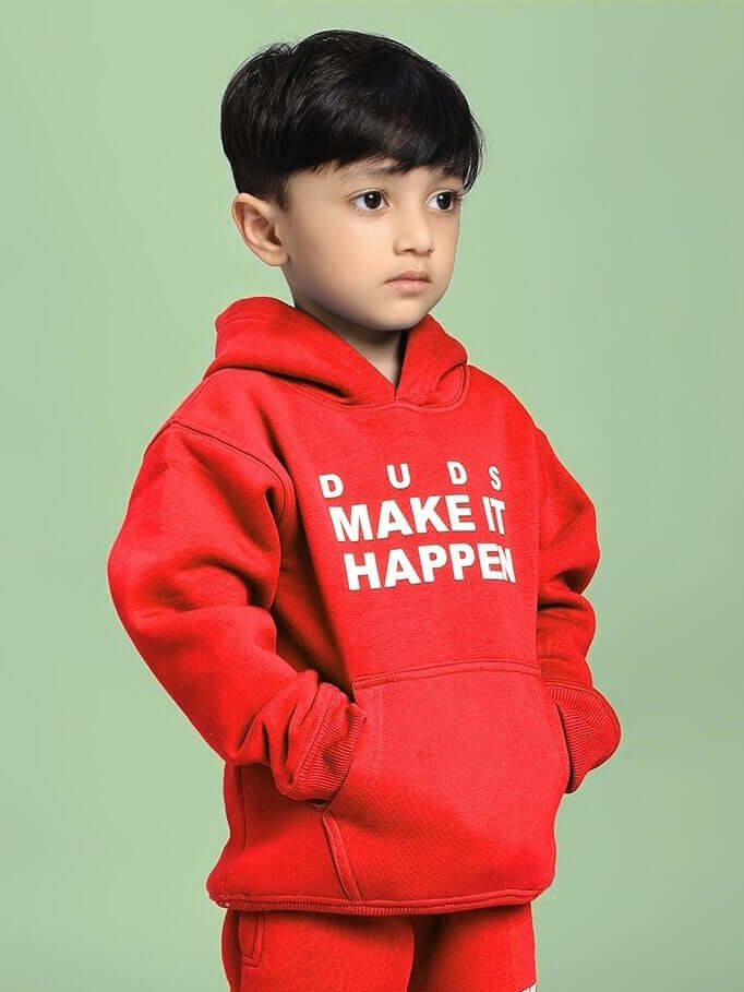 MAKE IT HAPPEN FLEECE HOODIE FOR BOYS AND GIRLS RED worn by a child, showcasing the bold style and comfort for kids' active lifestyle.