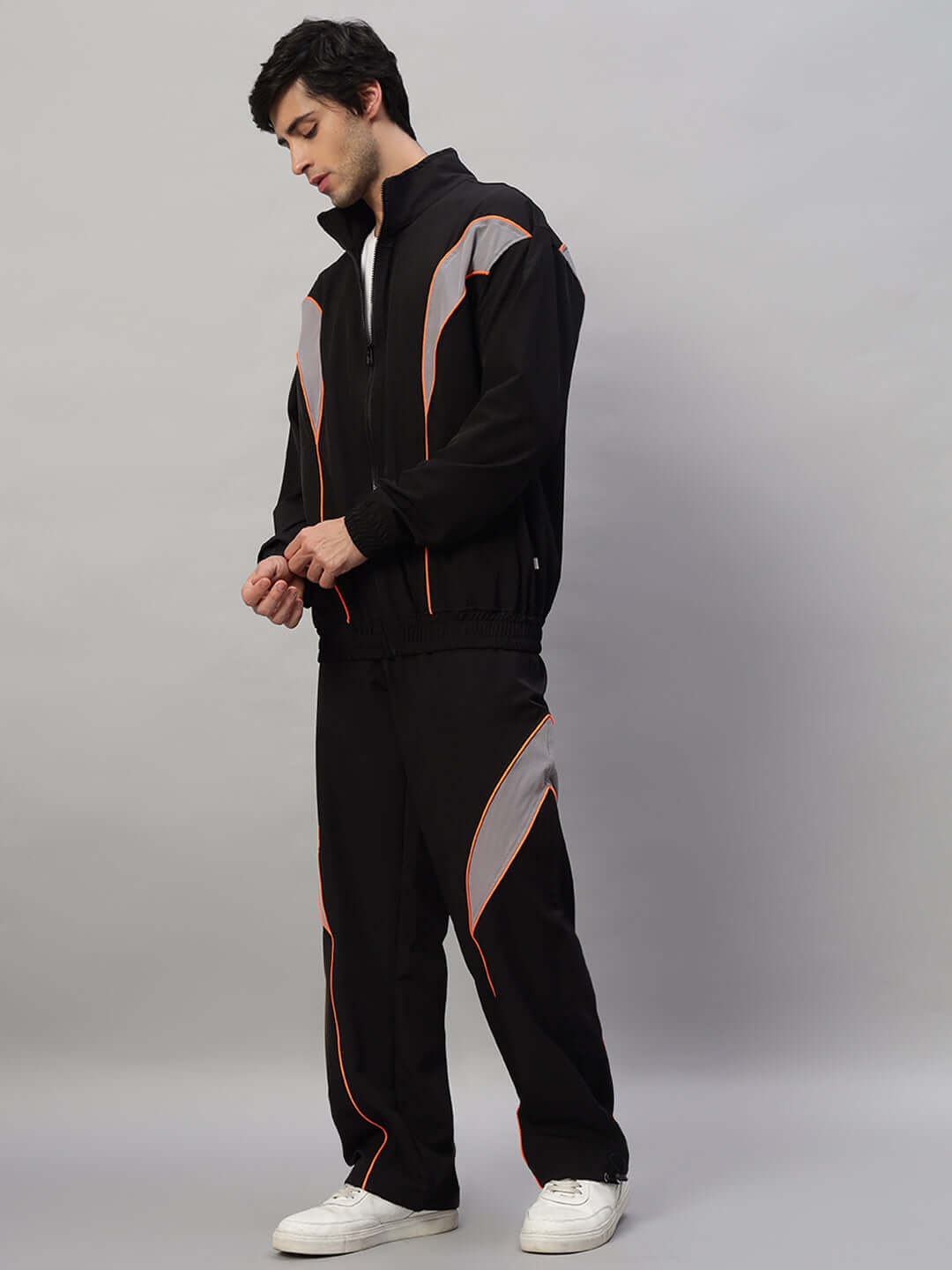 Man wearing BULLET OVERSIZED CO-ORD SET BLACK, showcasing stylish and relaxed streetwear fashion with modern silhouette.