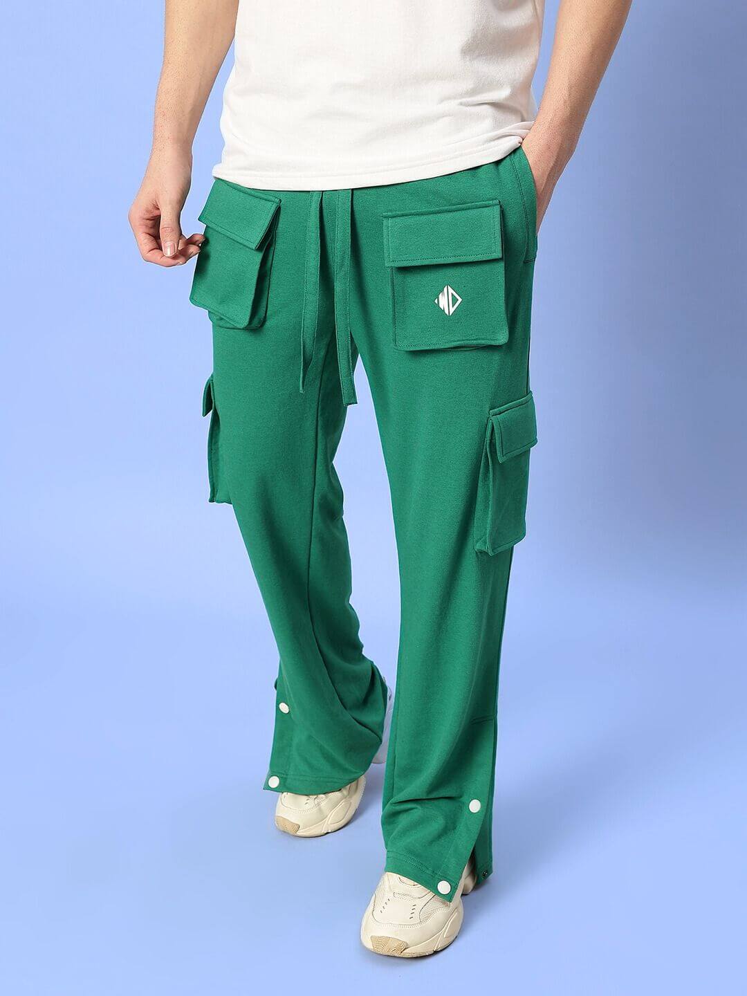 Model wearing green cargo pants with pockets, white sneakers, EASTON COTTON CO-ORD SET GREEN-WHITE ensemble