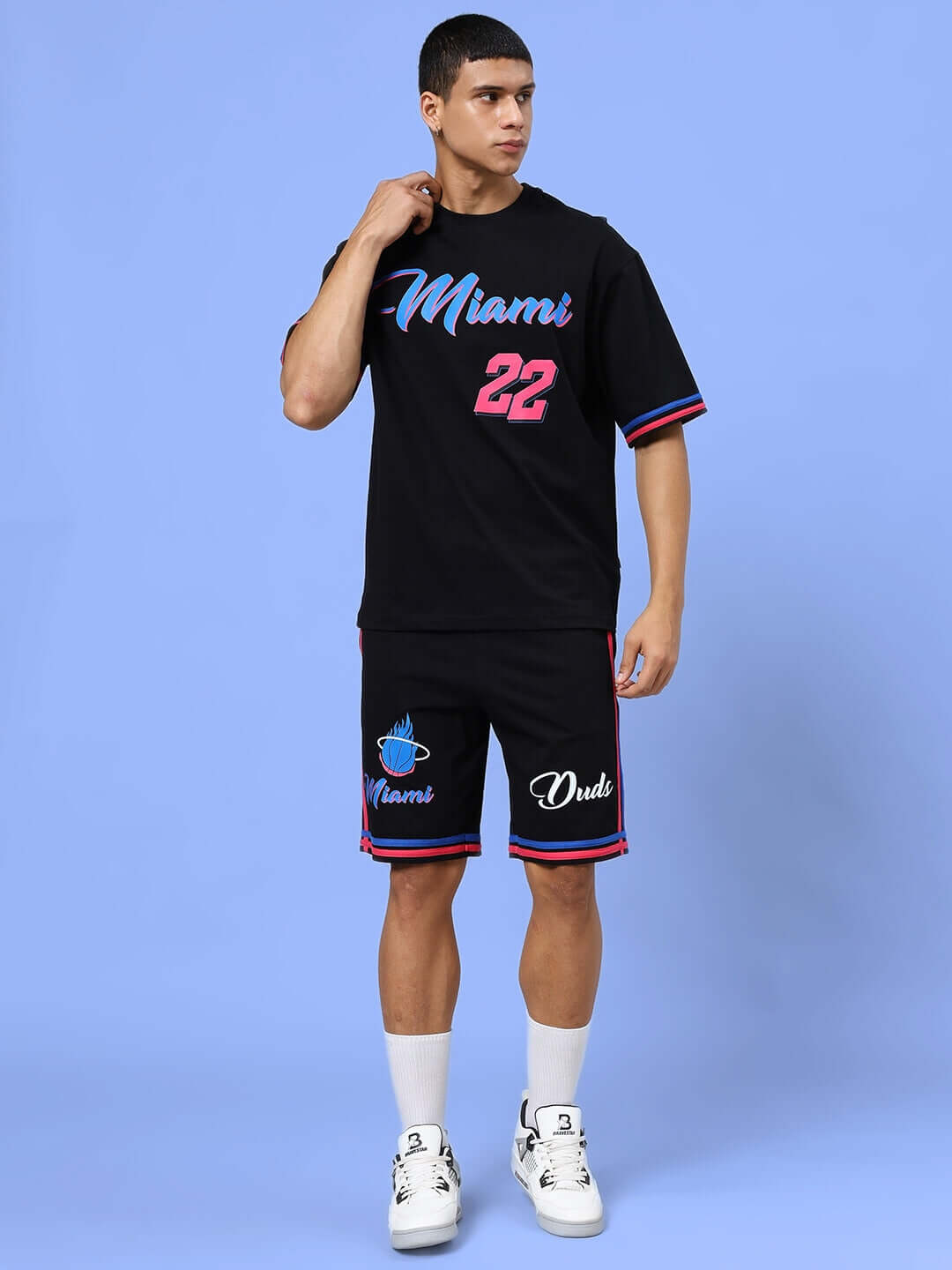 Black Miami Colorblock Co-Ord Set for men, featuring shorts and T-shirt made from premium cotton French Terry Lycra, modeled on a blue backdrop.