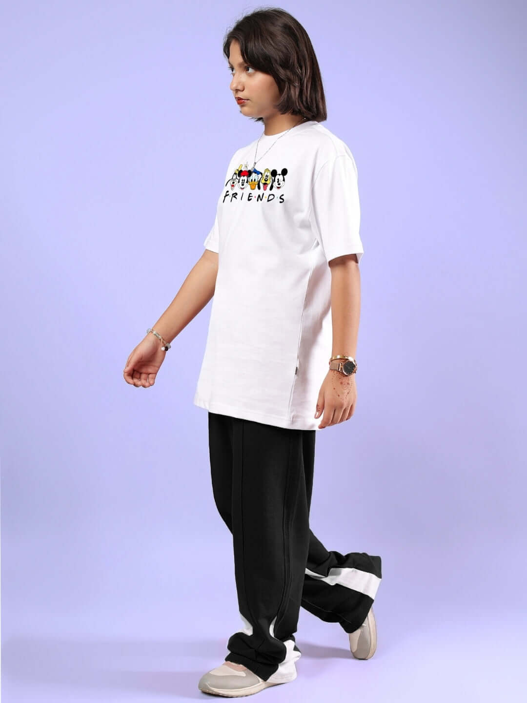 Child wearing MICKEY AND FRIENDS CO-ORD FOR BOYS & GIRLS WHITE-BLACK, featuring a Disney-themed T-shirt and joggers.