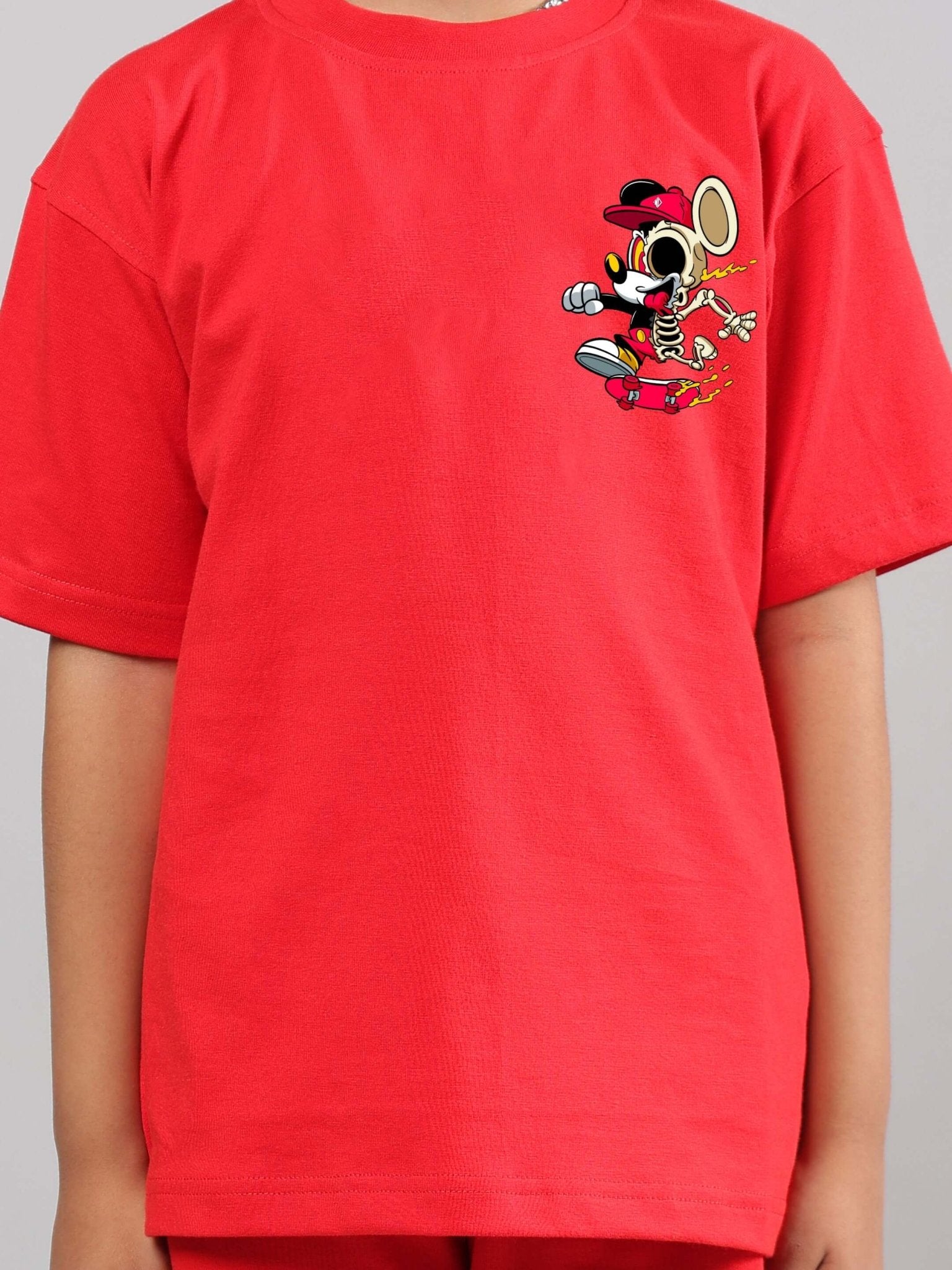 Child wearing MICKEY SUMMER T-SHIRT FOR BOYS GIRLS RED with Disney character print, showcasing vibrant color and style.