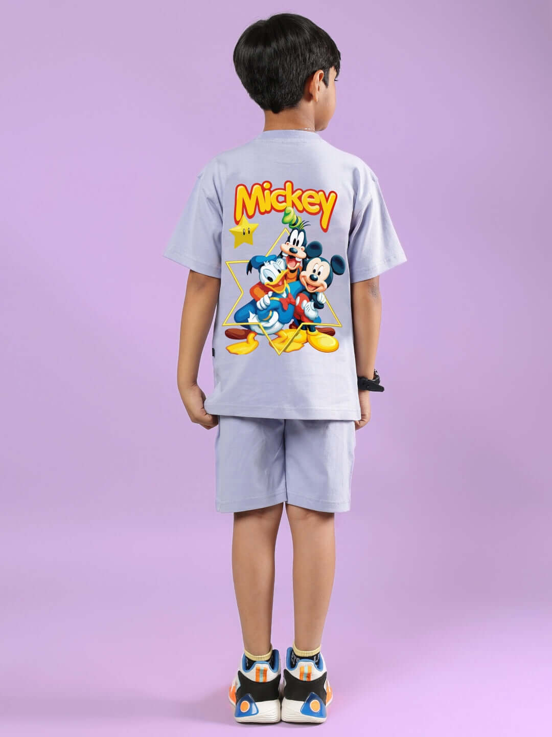 Child wearing lavender Mickey Dingo co-ord set with colorful characters, suitable for boys and girls, designed by DUDS.
