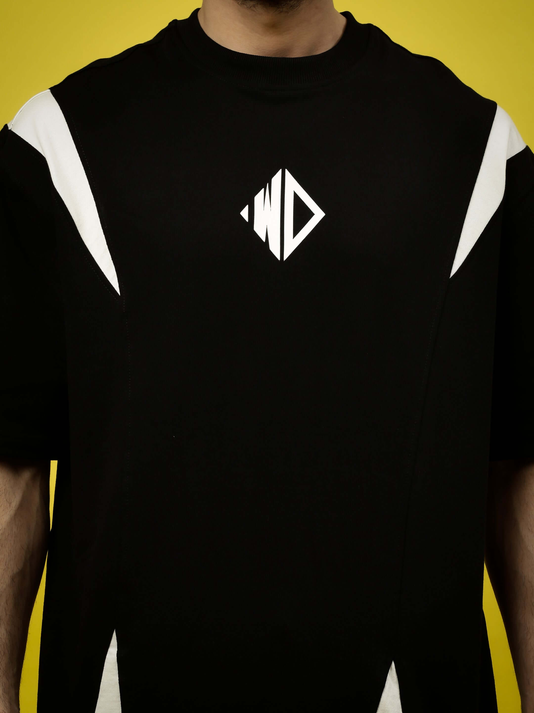 MIGHTY MORPHIN over-sized T-shirt in black and white with geometric design, made from premium cotton French terry fabric.
